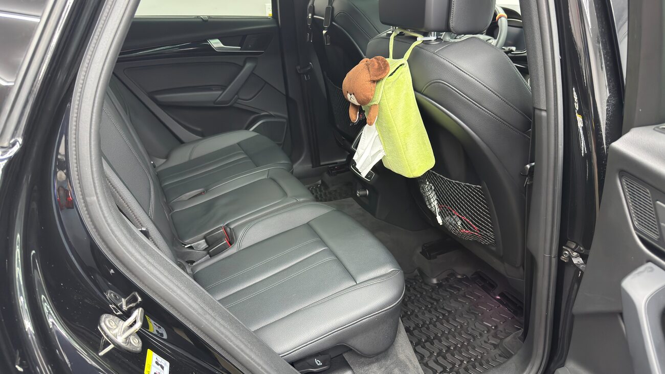 The same rear seats and footwell cleaned